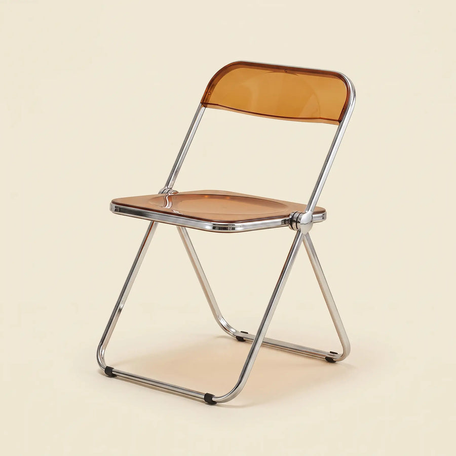 Lucent Folding Chair in Copper — translucent acrylic seat, chrome folding frame