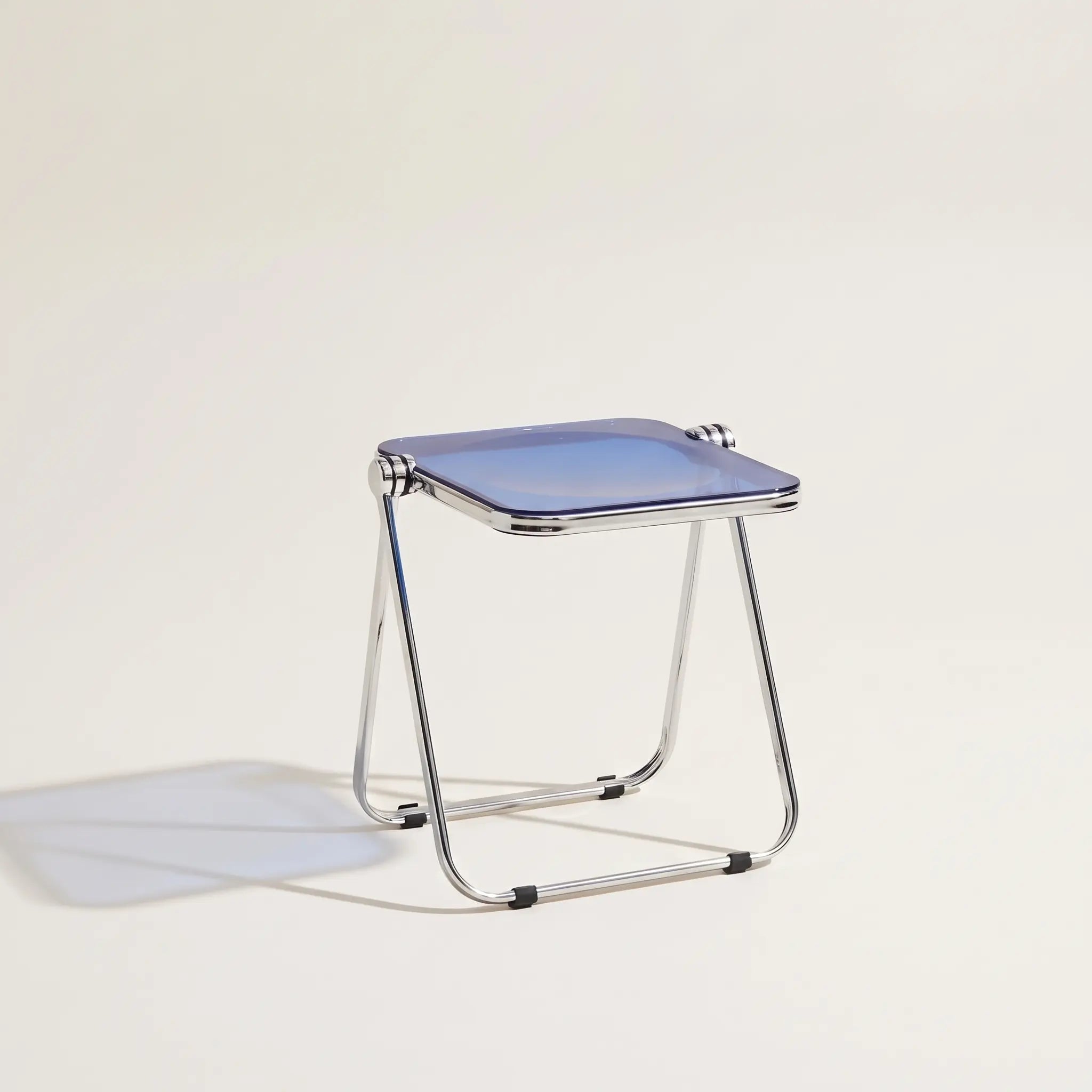 Lucent Tray Table in Blue — translucent blue acrylic top, chrome A-frame folding base