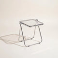 Lucent Tray Table in Clear — colourless transparent acrylic top, chrome A-frame folding base