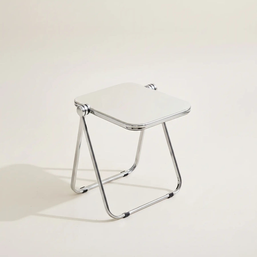 Lucent Tray Table in White — opaque off-white acrylic top, chrome A-frame folding base