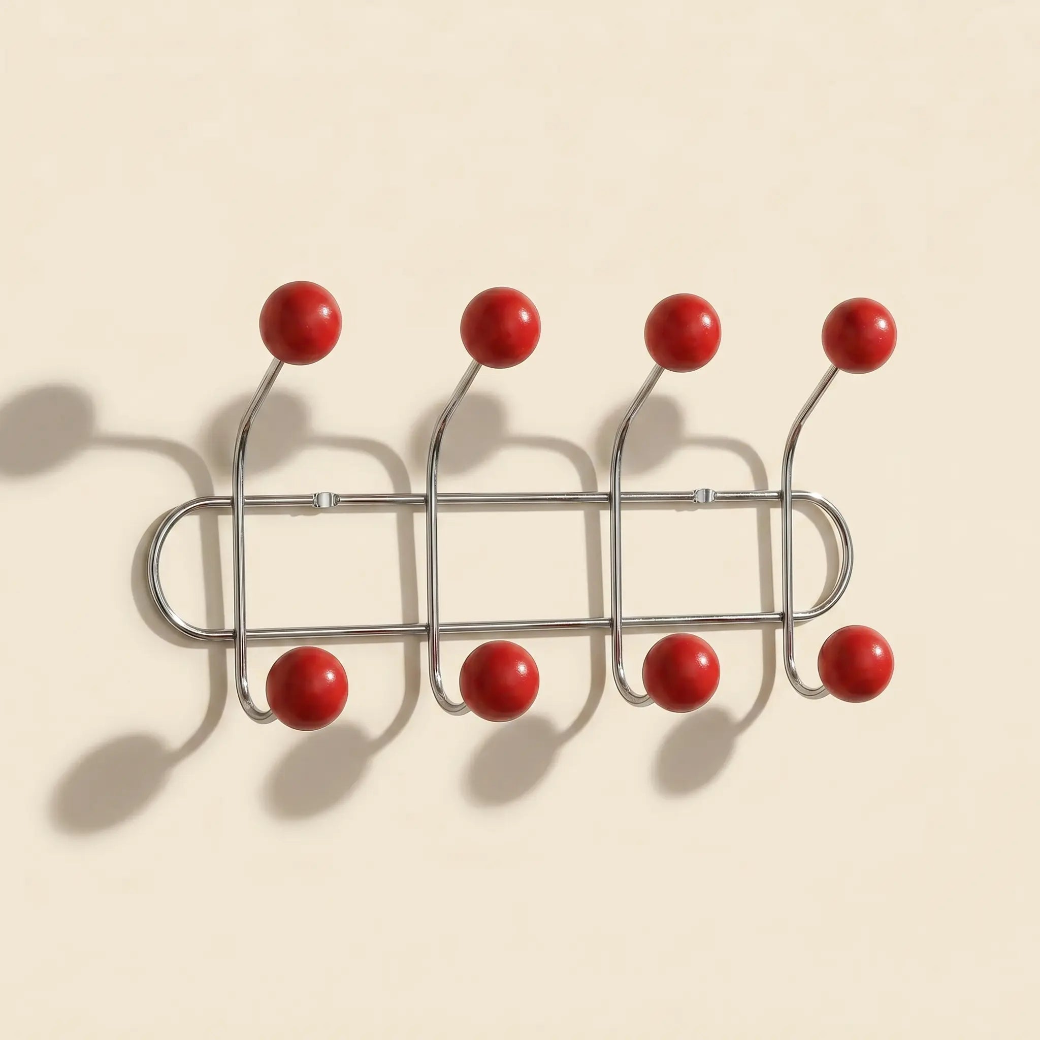 Wall Mounted Orbit Hook Rail in chrome and wood, styled in an entryway