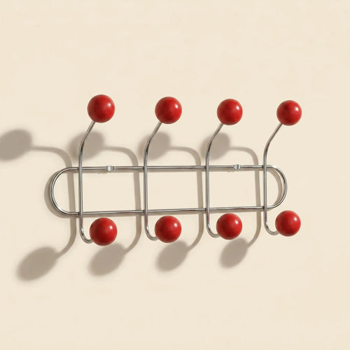 Wall Mounted Orbit Hook Rail in chrome and wood, styled in an entryway