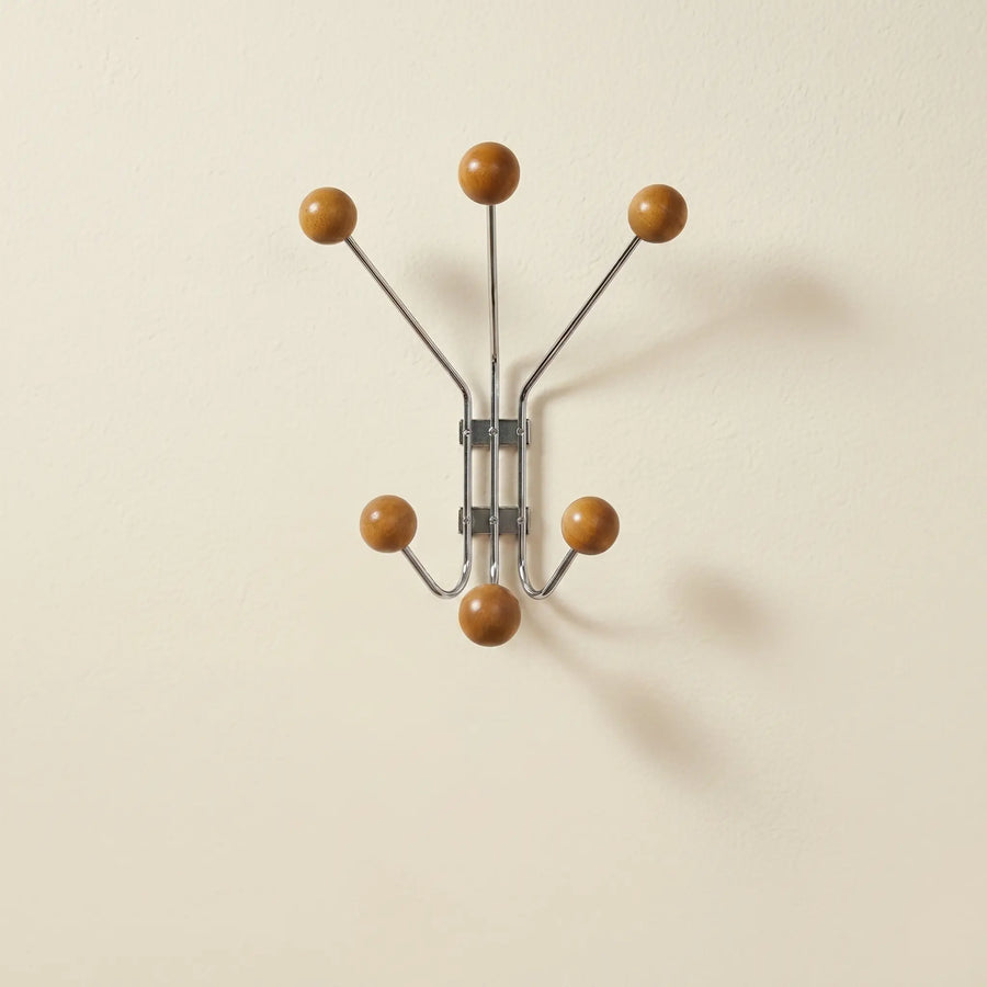 Wall Mounted Stellar Coat Rack in chrome and wood, six-hook starburst design