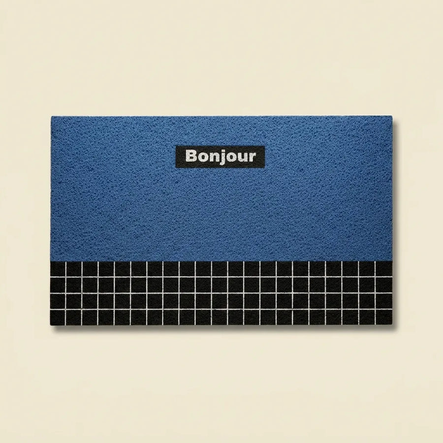 Blue Bonjour doormat in retro geometric PVC