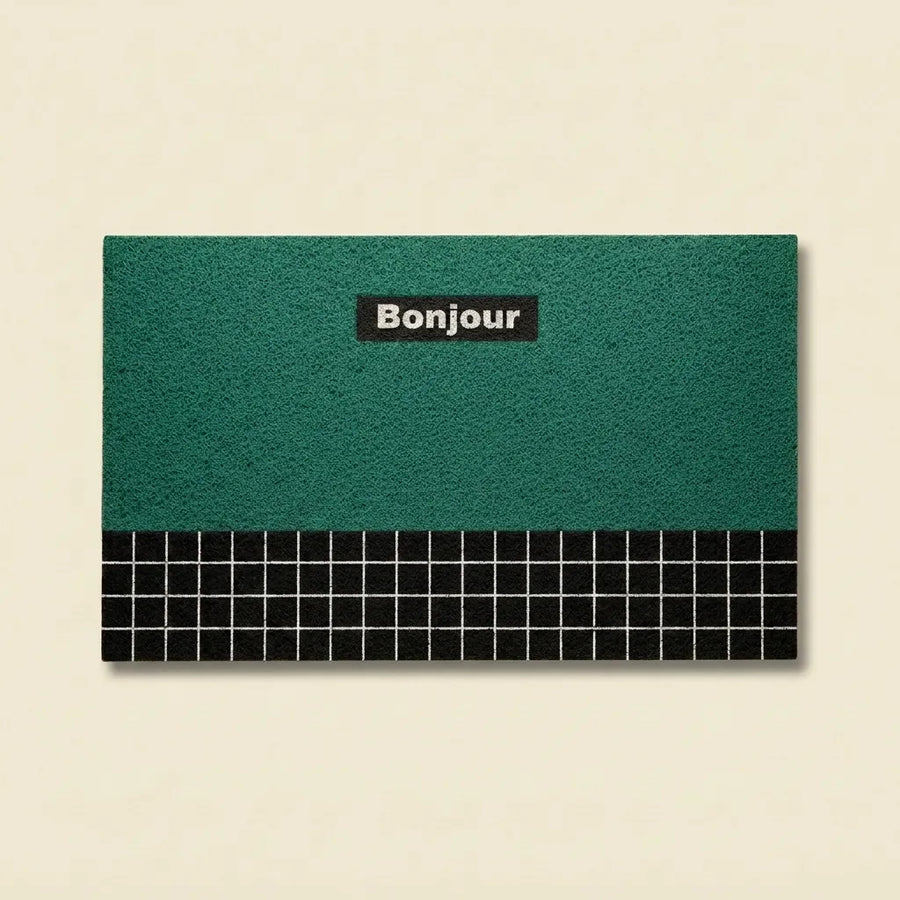 Green Bonjour doormat in retro geometric PVC