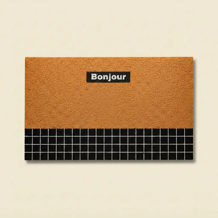 Orange Bonjour doormat in retro geometric PVC