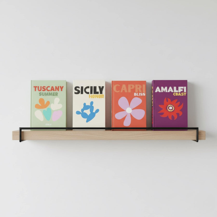 Italy edition faux book boxes on a shelf
