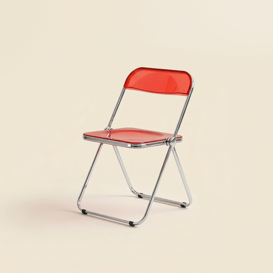 Clear acrylic Lucent Folding Chair on a chrome frame, folded flat against a wall