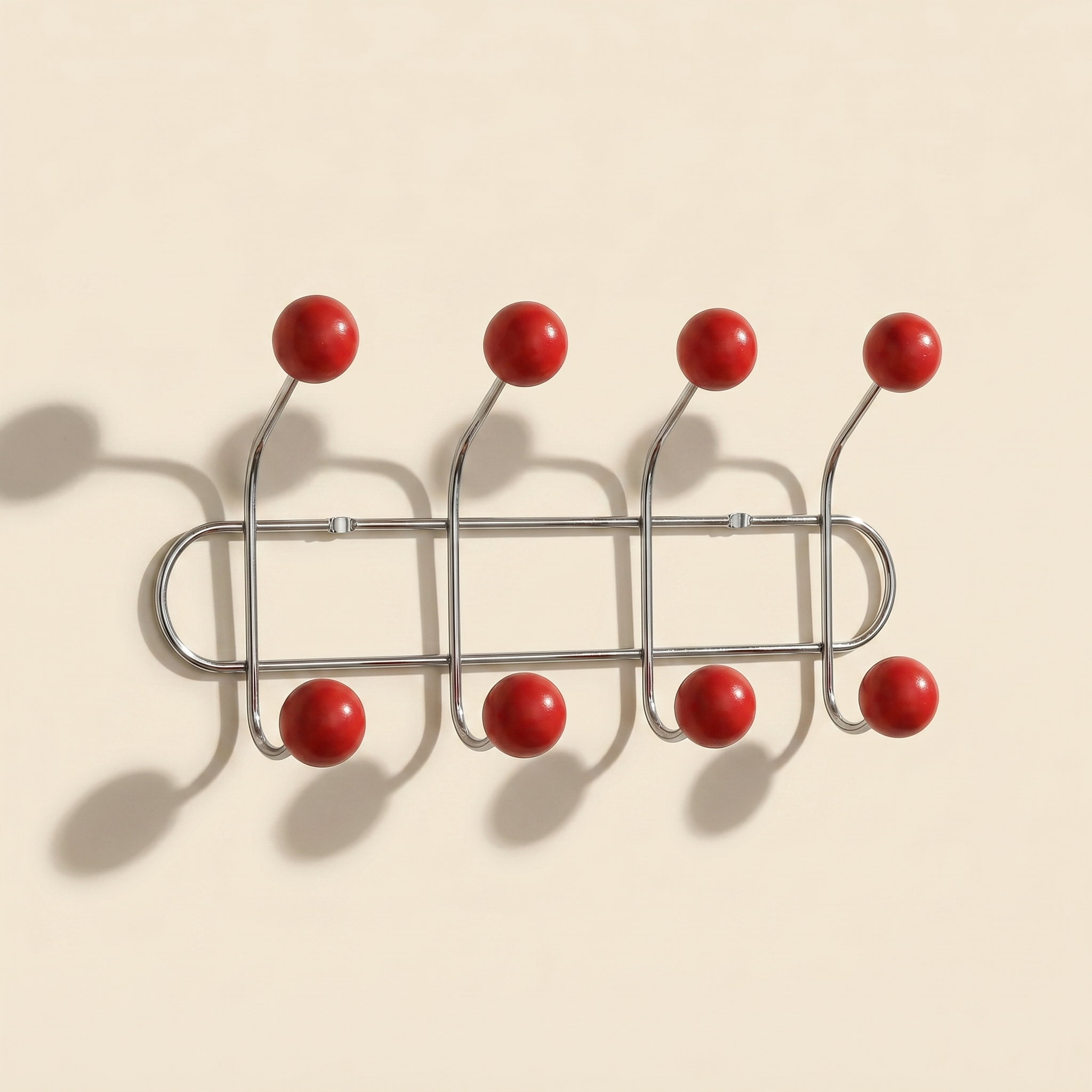 Wall Mounted Orbit Hook Rail in chrome and wood, styled in an entryway