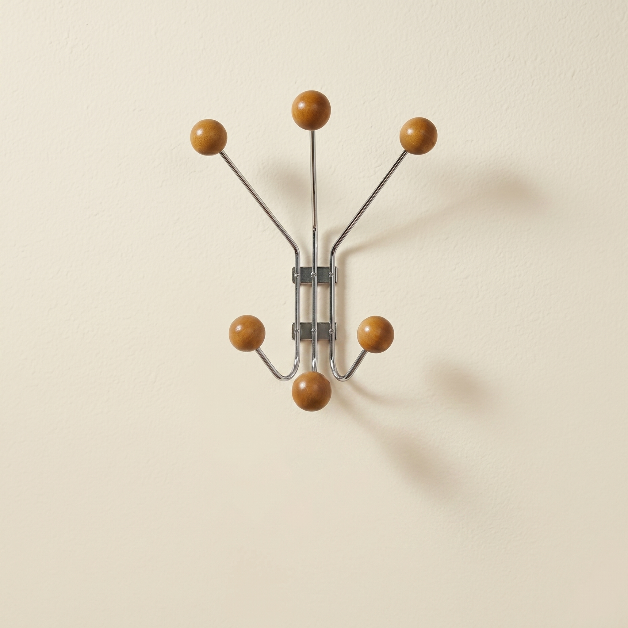 Wall Mounted Stellar Coat Rack in chrome and wood, six-hook starburst design