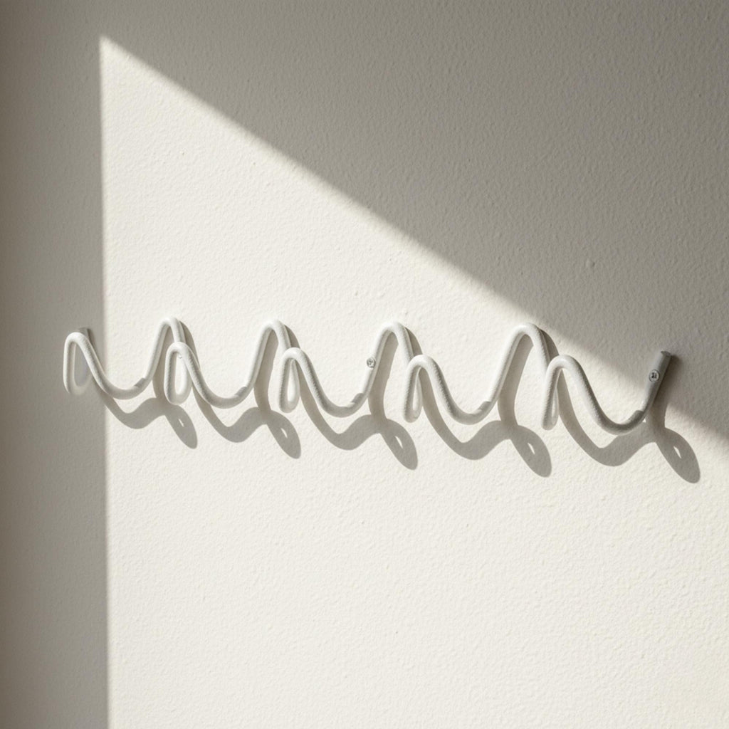 Wave Hook Rail — detail of hook curvature, clean bauhaus wave shape