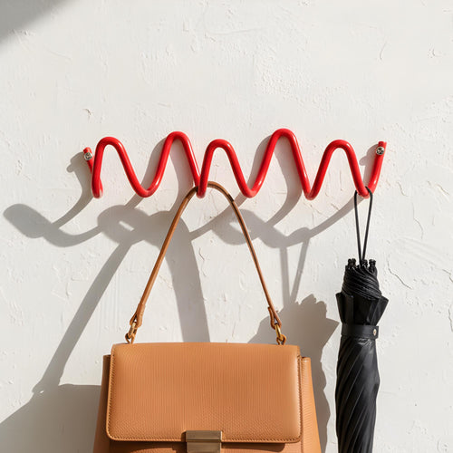 Wave Hook Rail product shot — front view showing wave profile and hook spacing