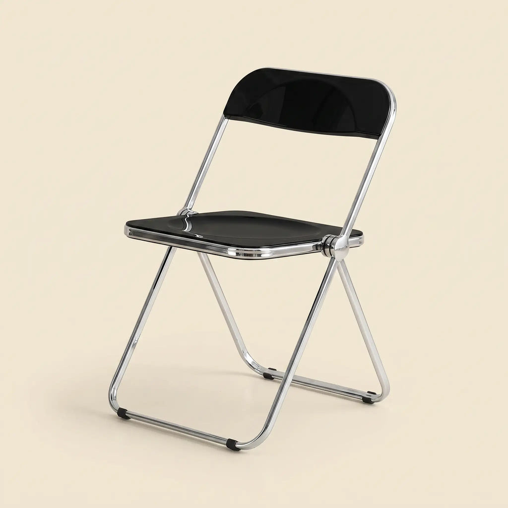 Lucent Folding Chair in Black — opaque seat, chrome folding frame