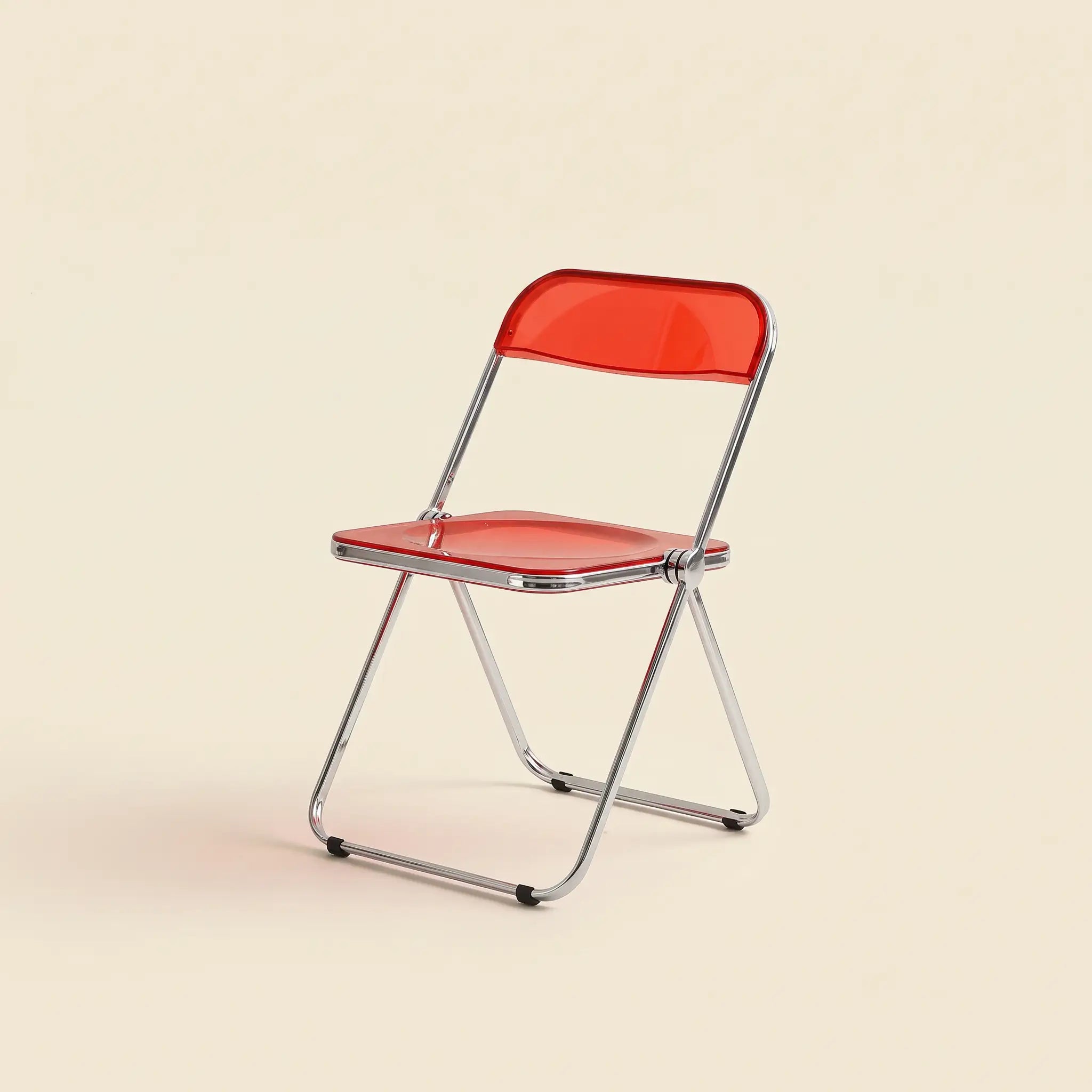 Lucent Folding Chair in Red — translucent acrylic seat, chrome folding frame