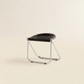 Lucent Folding Stool in Black — opaque seat, chrome folding frame