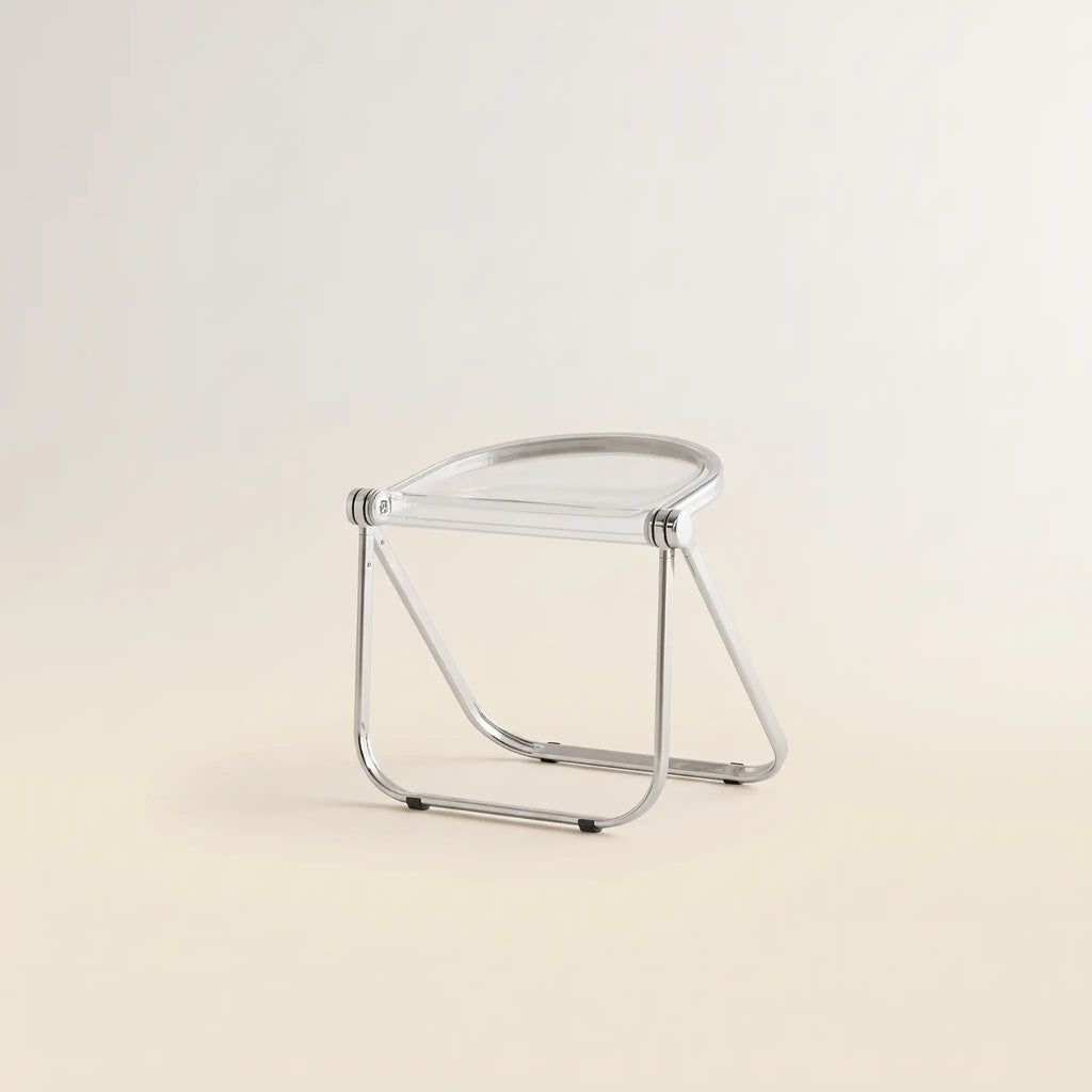 Lucent Folding Stool in Clear — translucent acrylic seat, chrome folding frame