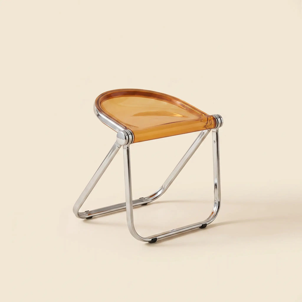 Lucent Folding Stool in Copper — translucent acrylic seat, chrome folding frame