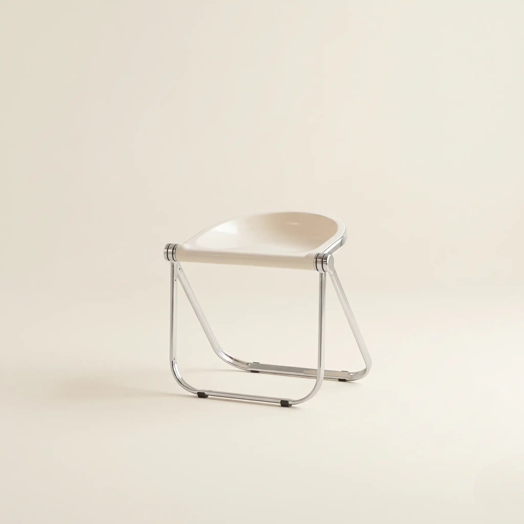 Lucent Folding Stool in White — opaque seat, chrome folding frame