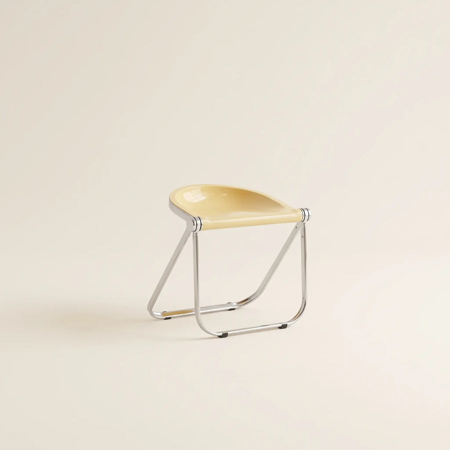 Lucent Folding Stool in Yellow — translucent acrylic seat, chrome folding frame