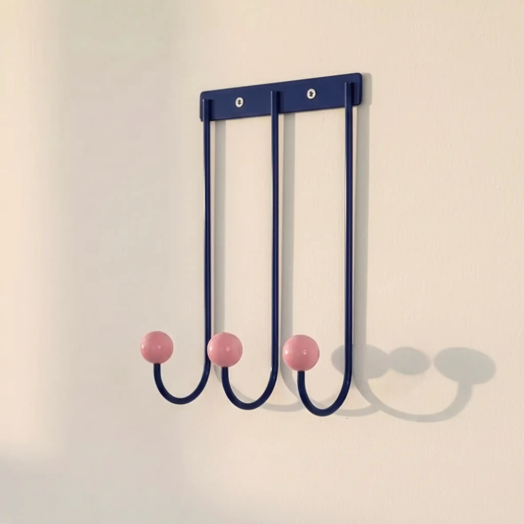 Sphere Hook Trio in Blue — blue 3-hook wall rack with pink wood ball tips