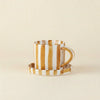 Tasse et soucoupe rayées