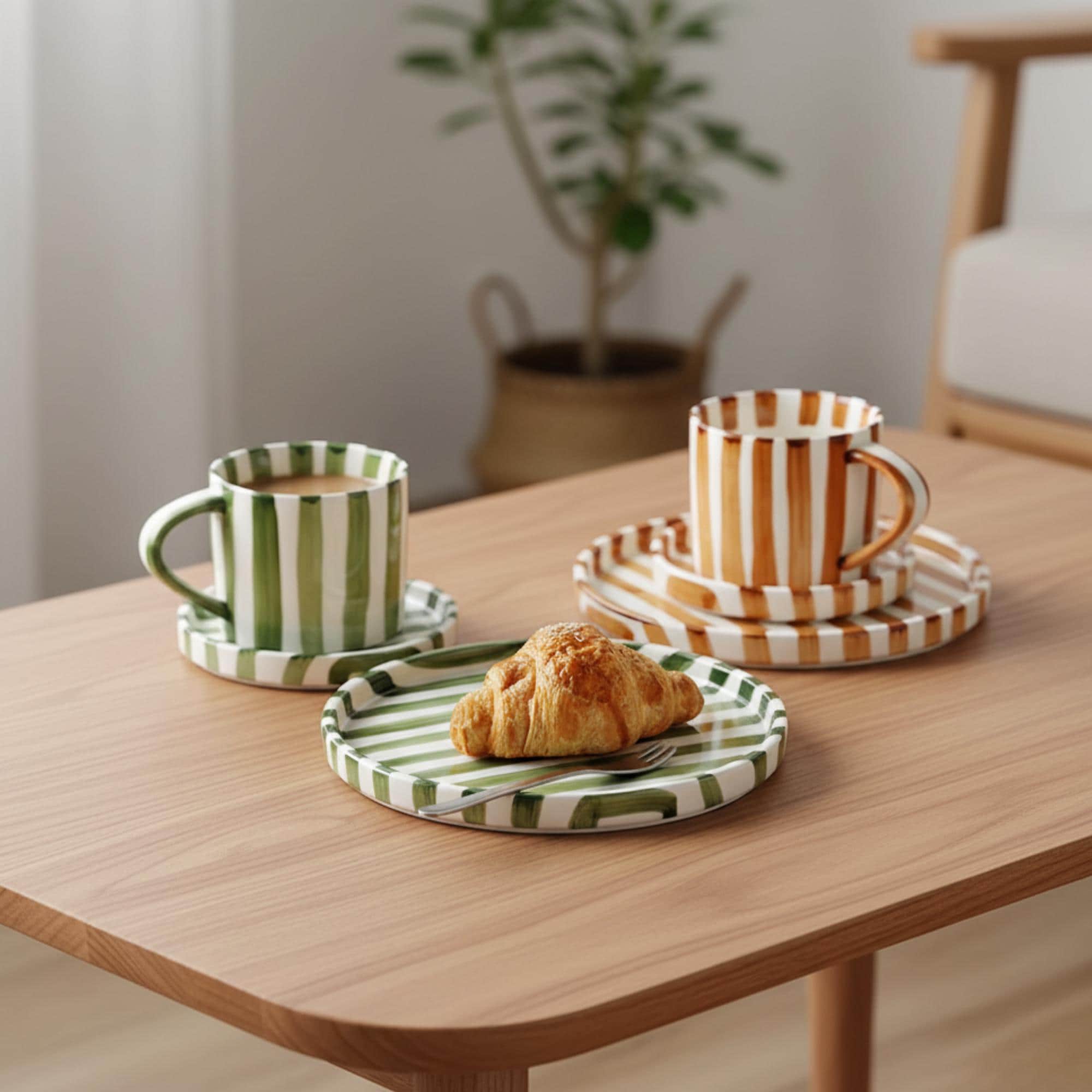 Striped ceramic cup and saucer on a table
